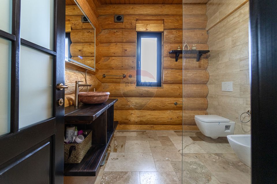 Doua case in stil canadian – confort modern intr-un cadru natural