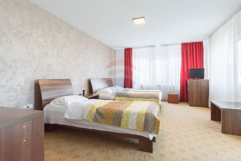 Hotel cu 23 unități de cazare, 2 săli de ședință, locație excelentă