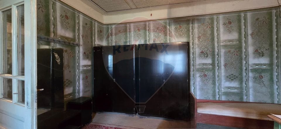 Teren si casă cu teren generos în Socodor