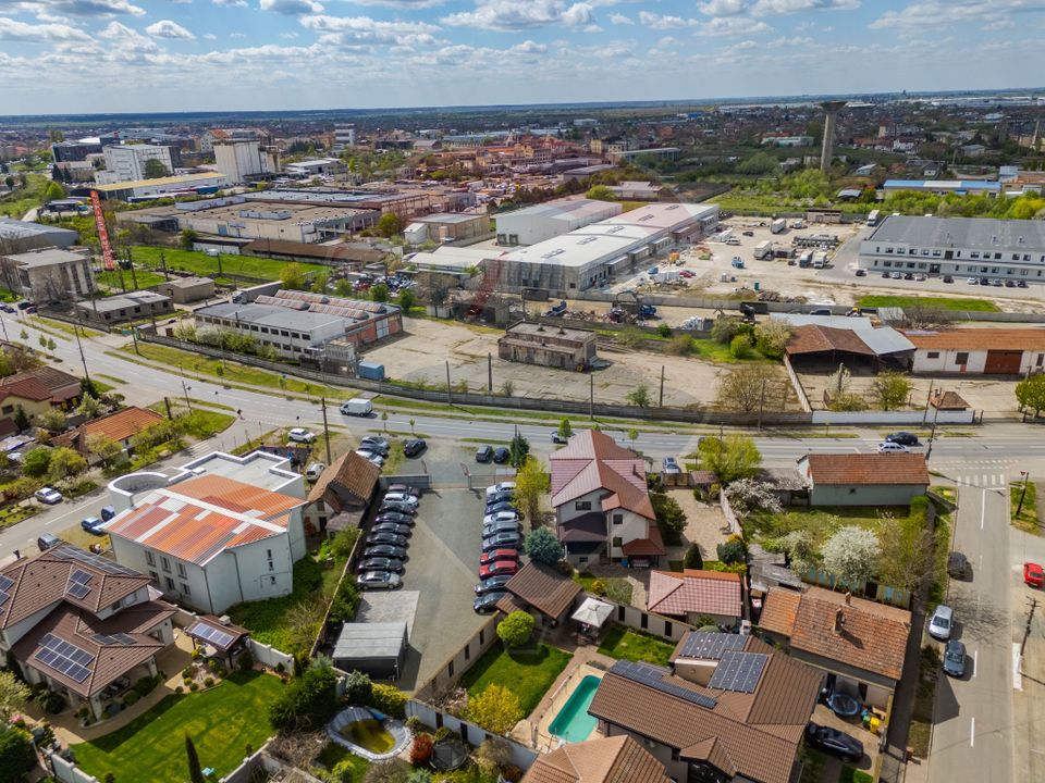 Teren 7619mp cu hala industriala/comerciala, FS - 110 ml de vanzare