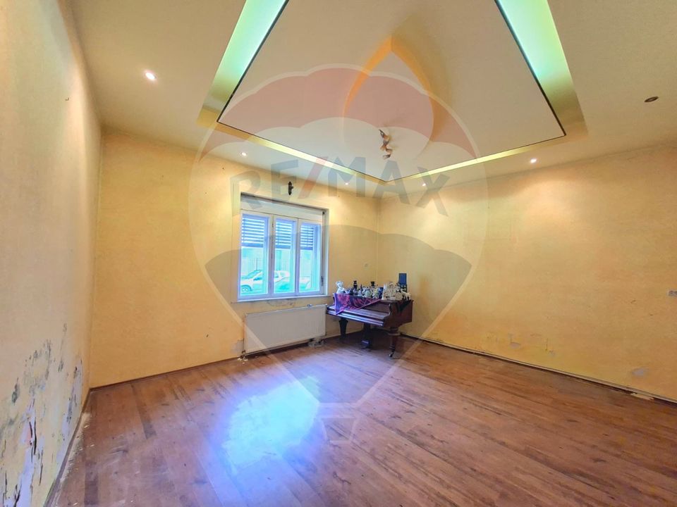 Proprietate centrală Arad,  cotă teren mare, acces auto