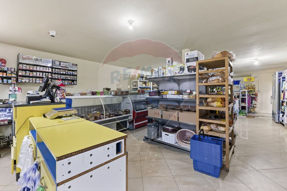 Casă spațioasă cu 4 camere și spațiu comercial în Bujac