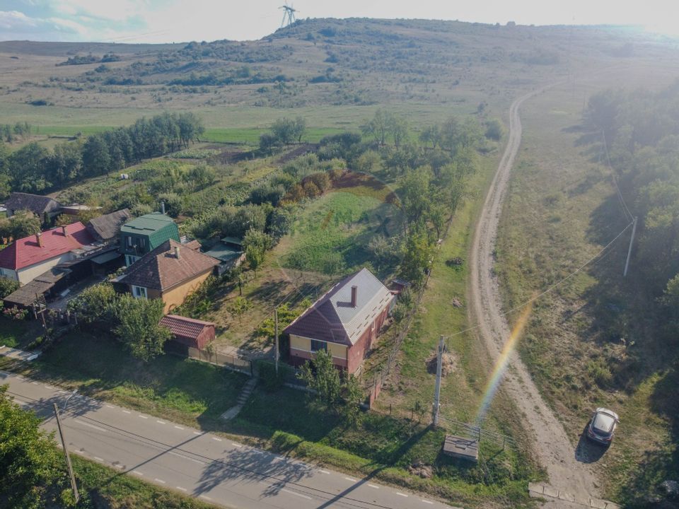 Casa traditionala din piatra de vanzare in Dabaca / teren 2040 mp