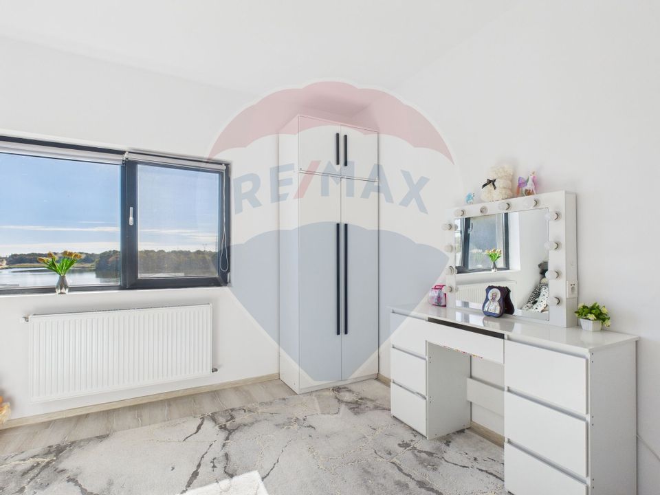 Duplex 85 mp utili, curte 200 mp – vedere la lac și pădure