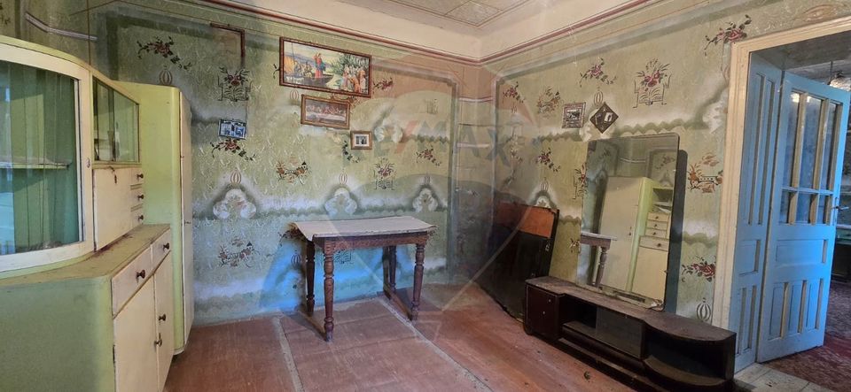 Teren si casă cu teren generos în Socodor