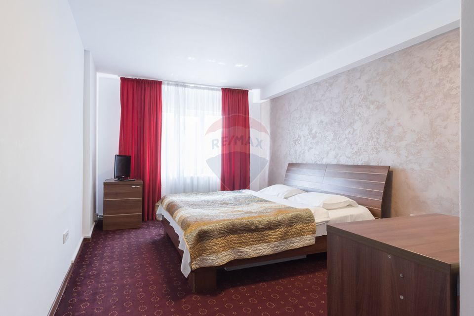 Hotel cu 23 unități de cazare, 2 săli de ședință, locație excelentă