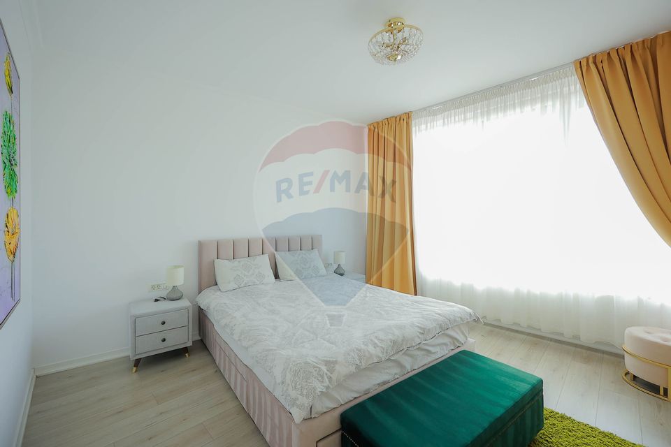 Clădire multifuncțională de vânzare – spațiu comercial + 2 apartamente