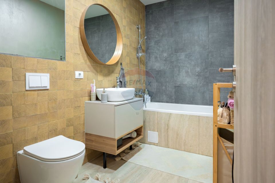 Apartament cu 2 camere,  2 băi și parcare subterană în Tractorul