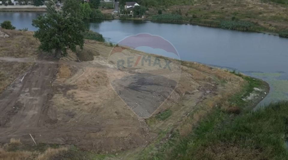 Teren Intravilan de Vânzare – 5.000 mp cu Deschidere la Lac.