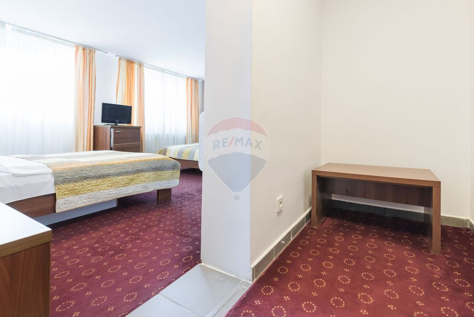 Hotel cu 23 unități de cazare, 2 săli de ședință, locație excelentă