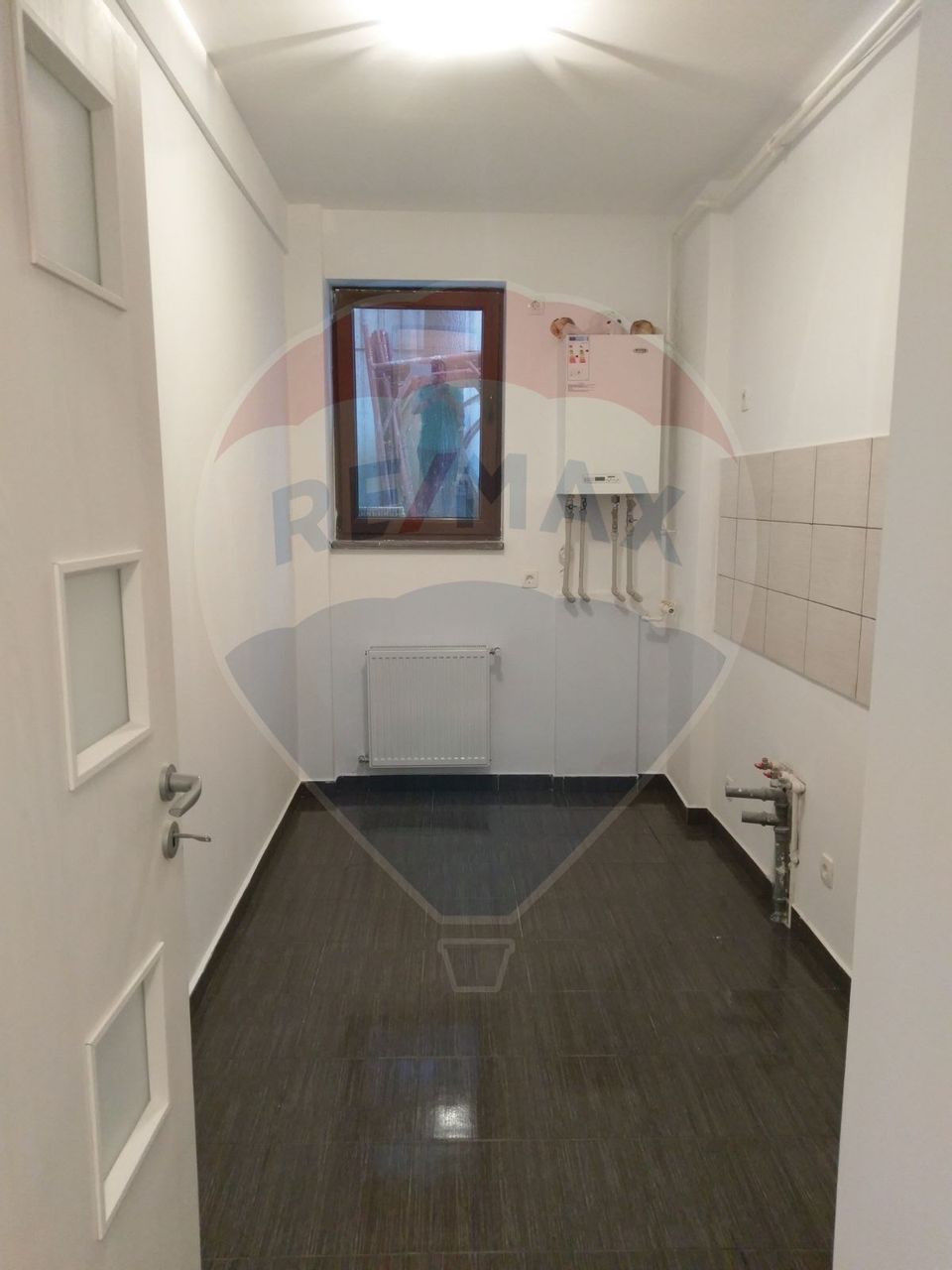 2 room apartment + central heating + parking space for sale Gorj area