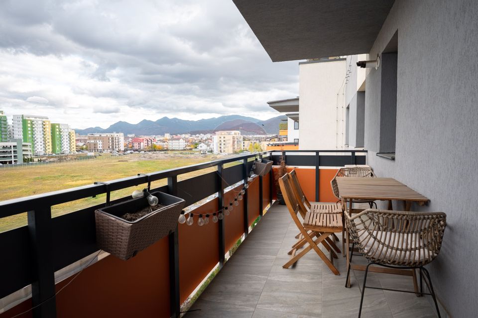 Apartament cu 2 camere,  2 băi și parcare subterană în Tractorul