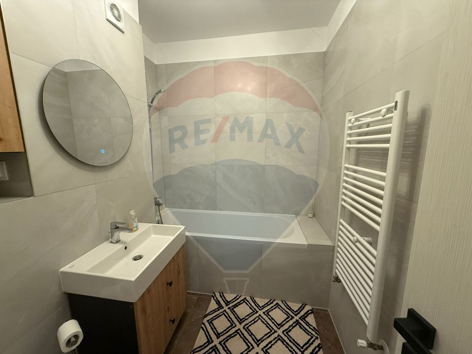 Apartament cu 3 camere, 2 bai și loc de parcare
