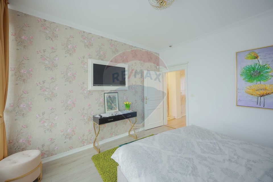 Clădire multifuncțională de vânzare – spațiu comercial + 2 apartamente