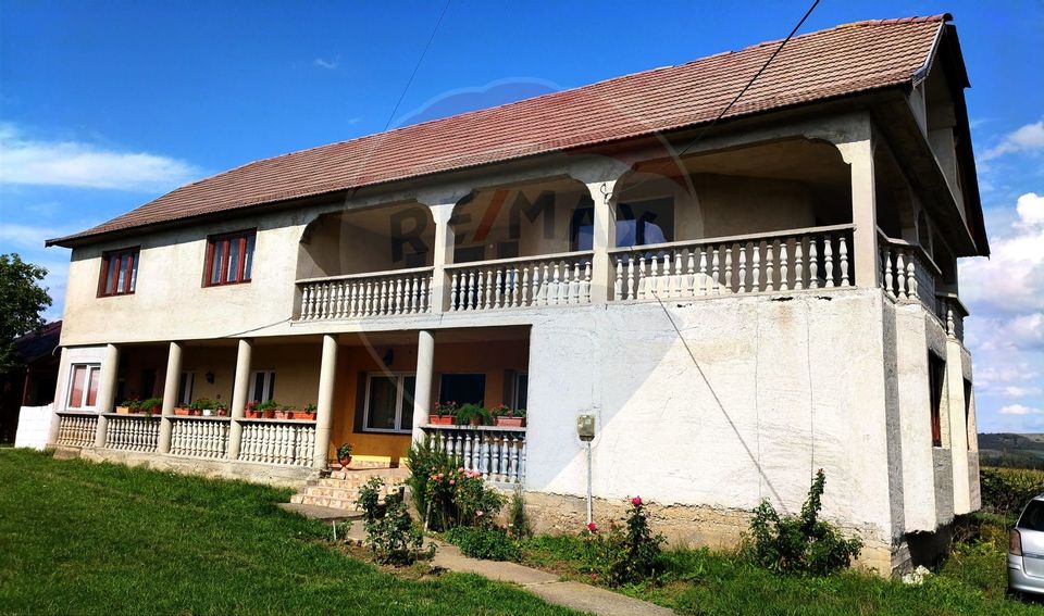 Casă de vânzare cu  teren de 3.869 mp în Cosniciu de Jos /Ip, Sălaj