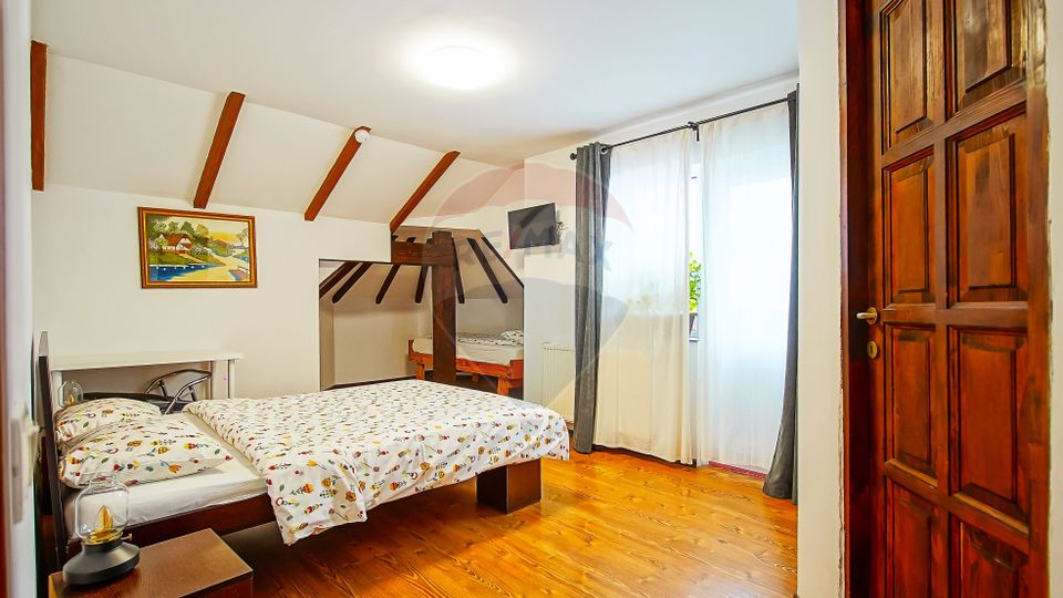 Cabana la Flo, 8 cam,P + M, teren 888 mp oportunitate de investitie !