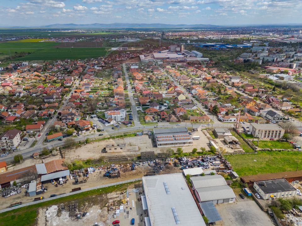 Teren 7619mp cu hala industriala/comerciala, FS - 110 ml de vanzare