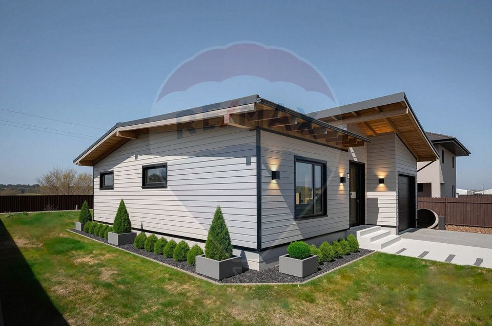 Casă cu 4 camere de vânzare, 130mp utili, teren 600mp in Harman