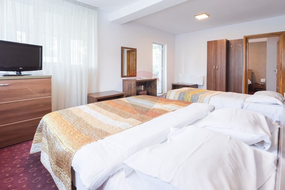 Hotel cu 23 unități de cazare, 2 săli de ședință, locație excelentă