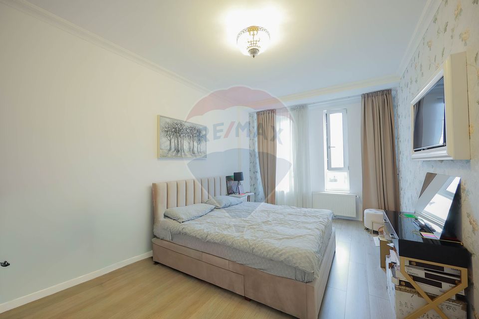 Clădire multifuncțională de vânzare – spațiu comercial + 2 apartamente