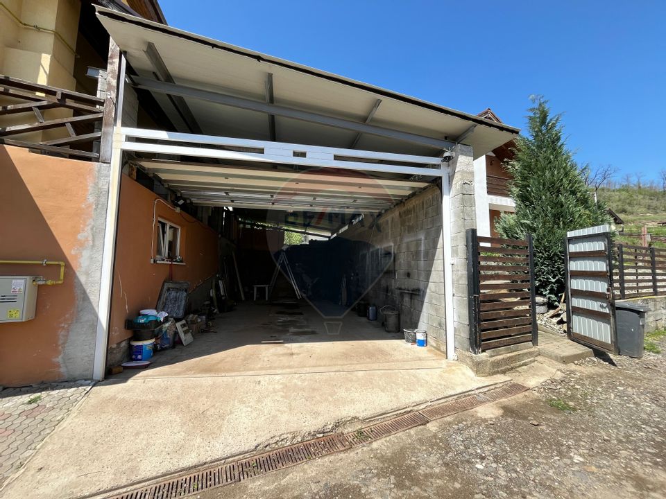 Casă cu vedere spre lac și pădure -deasupra  Barajului Ighis