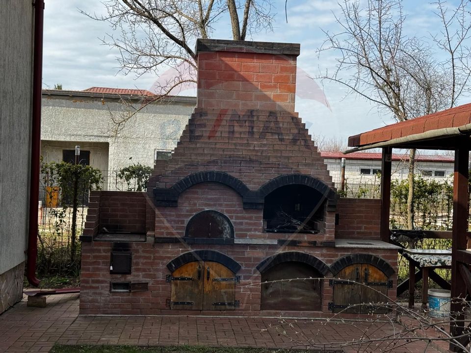 Casă de vânzare cu livadă și piscină – Giurgiu