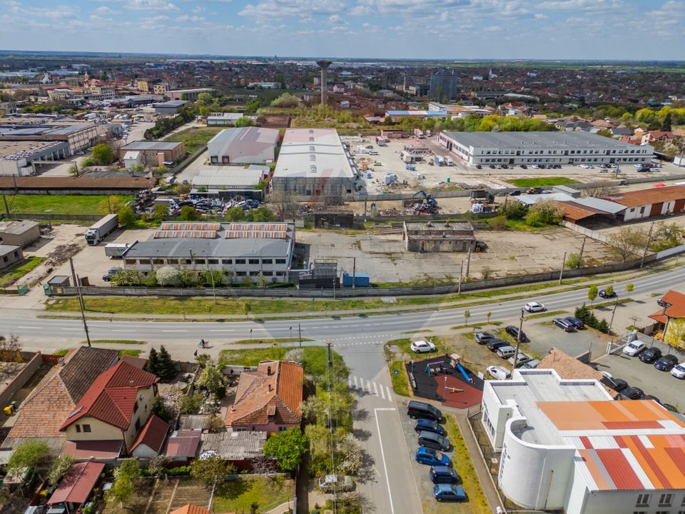 Teren 7619mp cu hala industriala/comerciala, FS - 110 ml de vanzare
