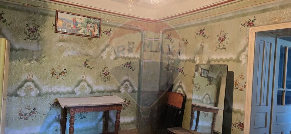 Teren si casă cu teren generos în Socodor