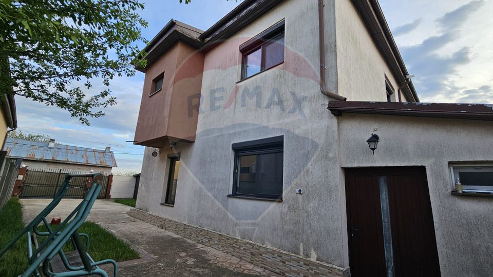 Casă / Vilă cu 4 camere de vânzare Dragomirești-Vale, curte proprie