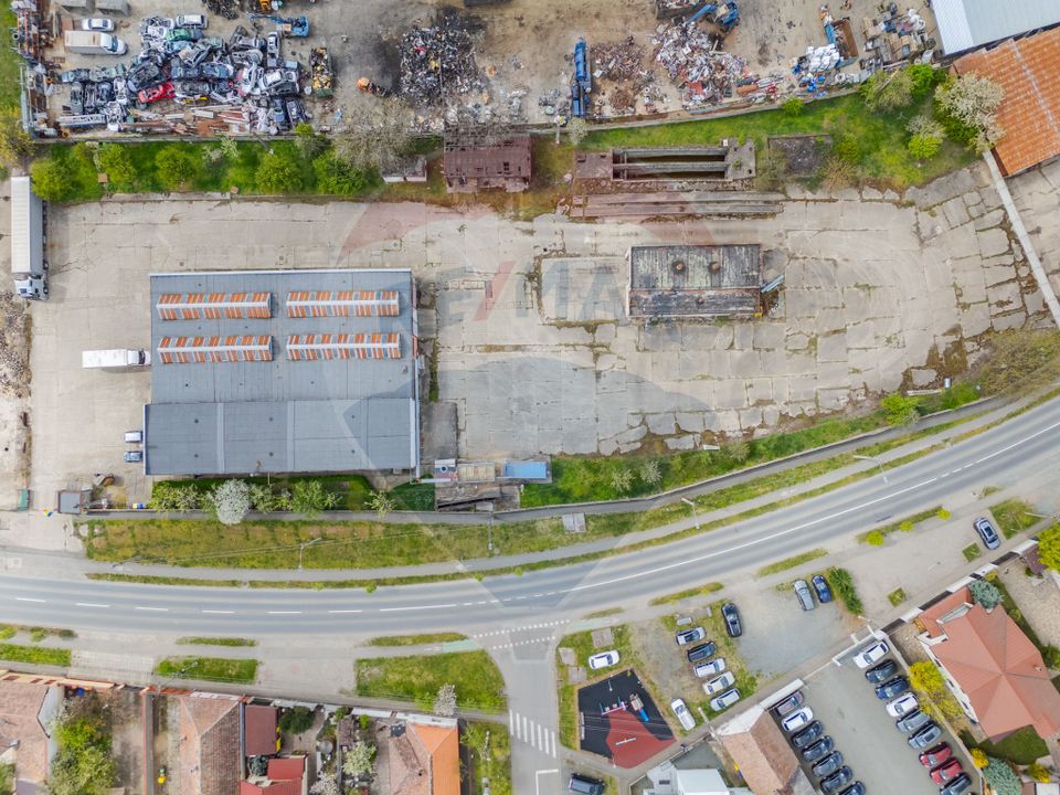 Teren 7619mp cu hala industriala/comerciala, FS - 110 ml de vanzare