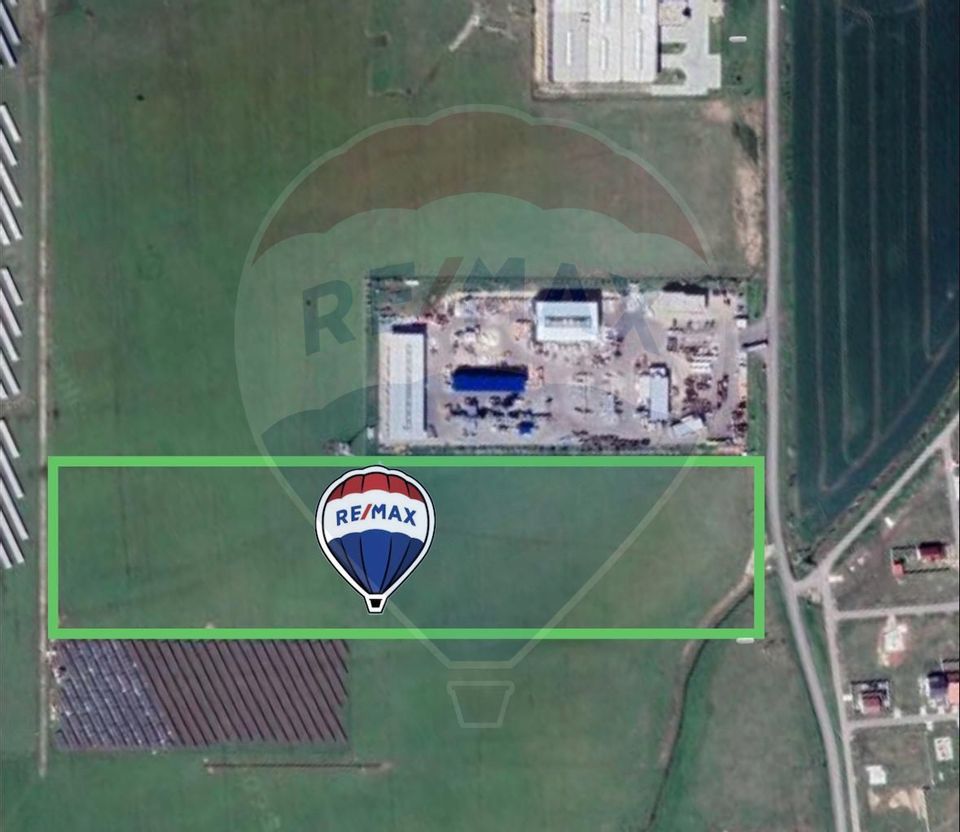 Teren 5,9 ha intravilan front stradal 150 m la 8km de Arad