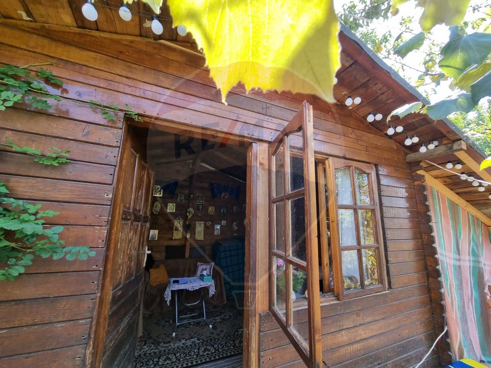 Teren intravilan 1200 mp +cabana lemn-zona rezidentiala-Drumul Taberei