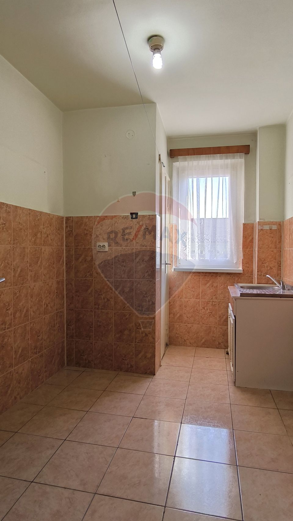 Apartament cu 3 camere, et. 1 in cartierul Gura Campului