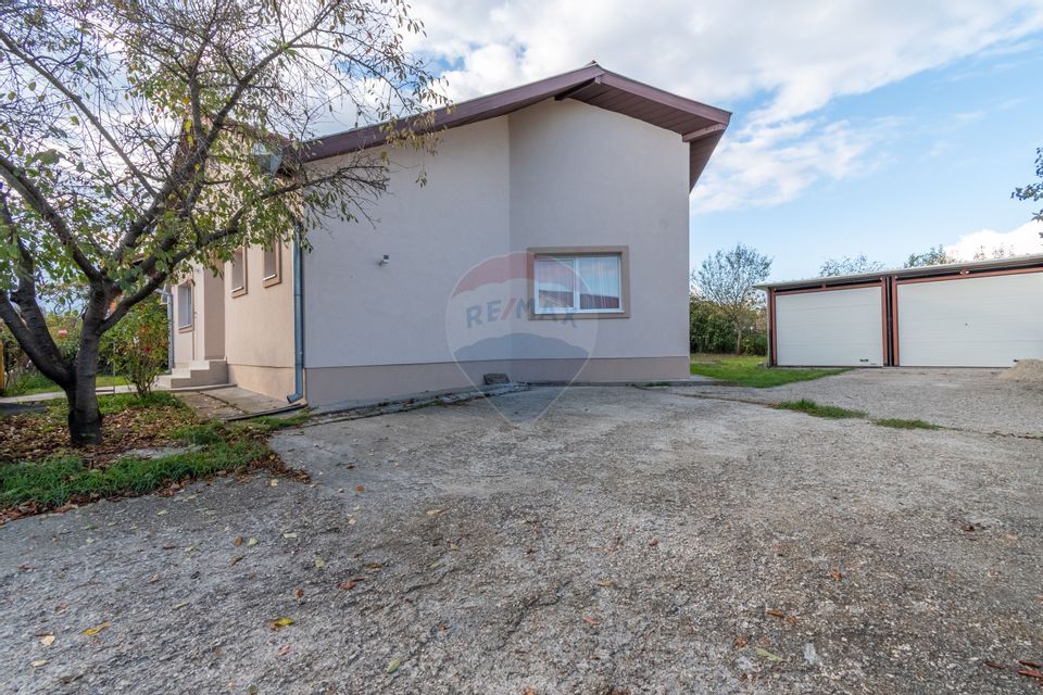 Casa individuala de vanzare 100mp, 600mp teren, garaj, zona Panemar