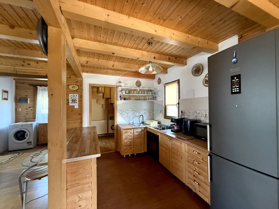 Comision 0% Casă de vânzare în Stolna cu livada,ciubăr,teren de 1464mp