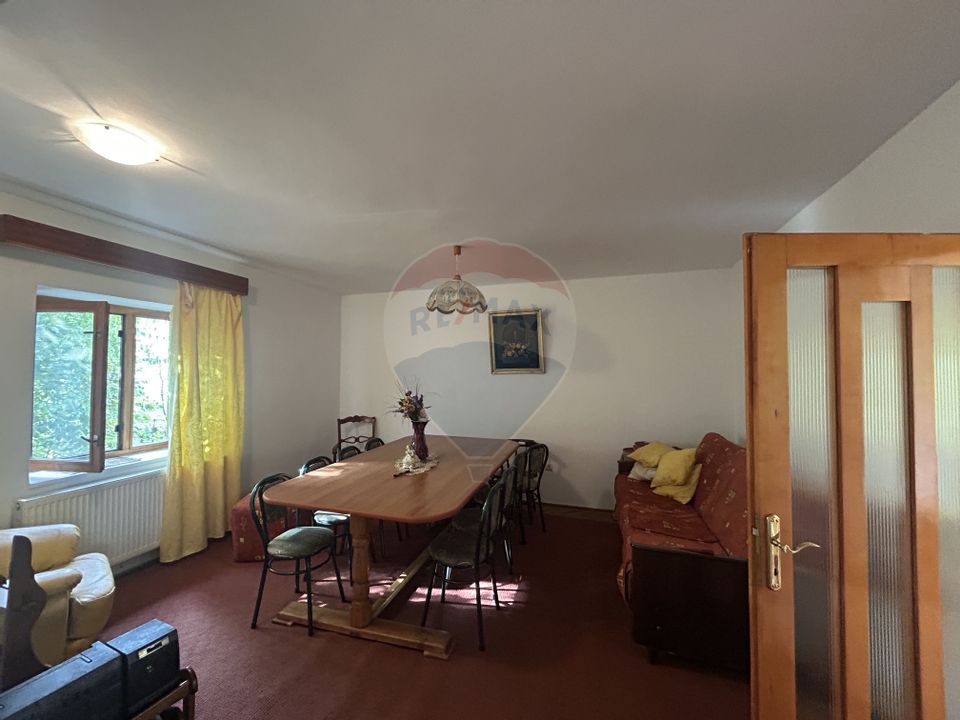 Casa - sura cu 16 ari teren de vânzare în Buşag