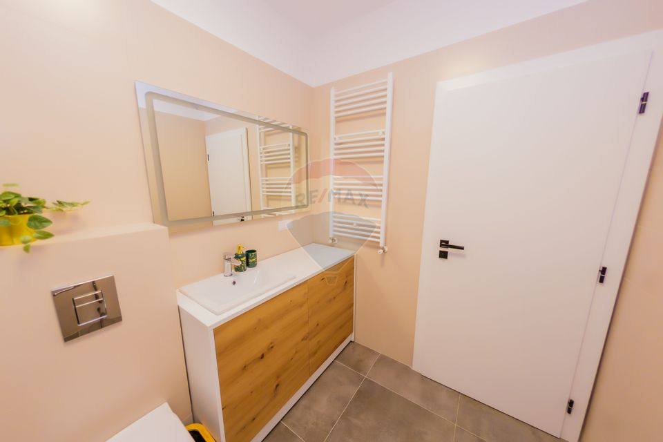 SUPER APARTAMENT la prima închiriere cu loc de parcare subteran inclus