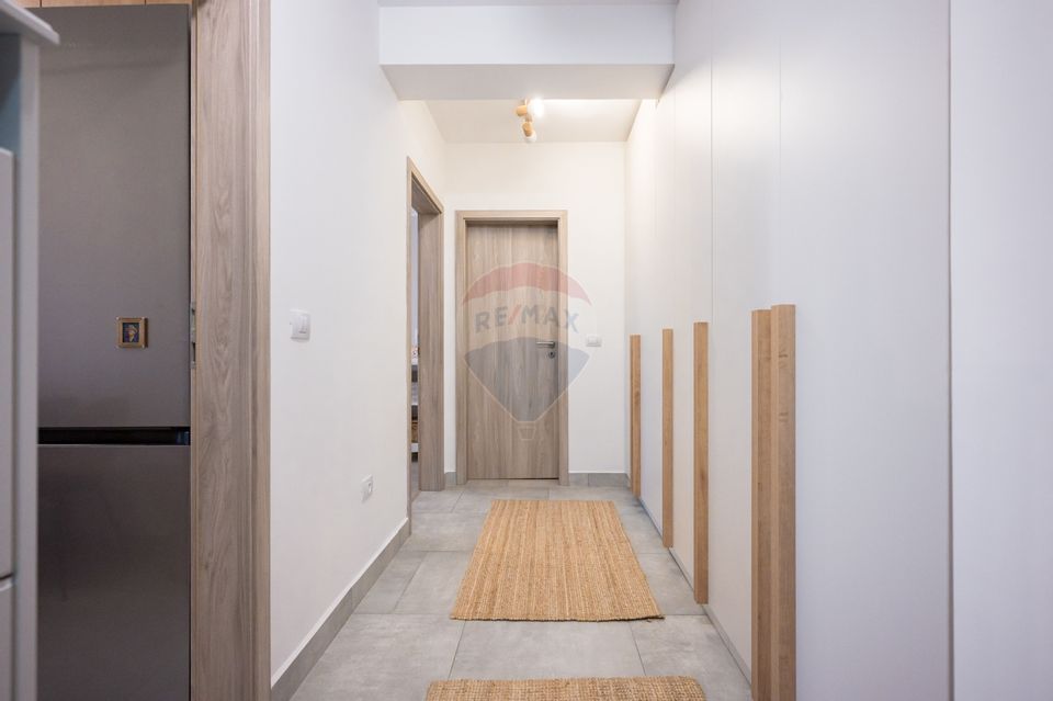 Apartament cu 2 camere,  2 băi și parcare subterană în Tractorul