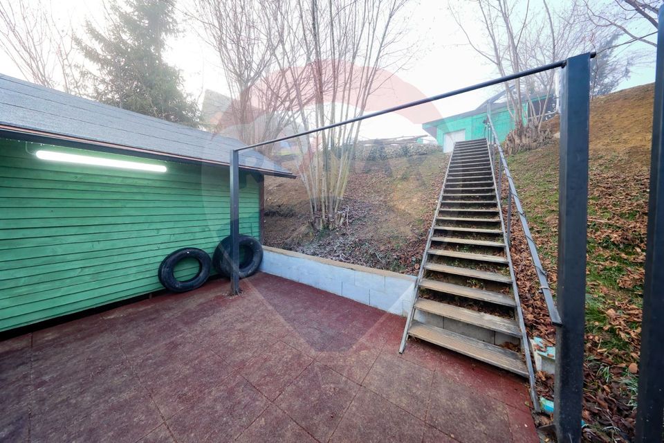 Ansamblu rezidențial cu casă principală și anexe, teren 1.487 mp