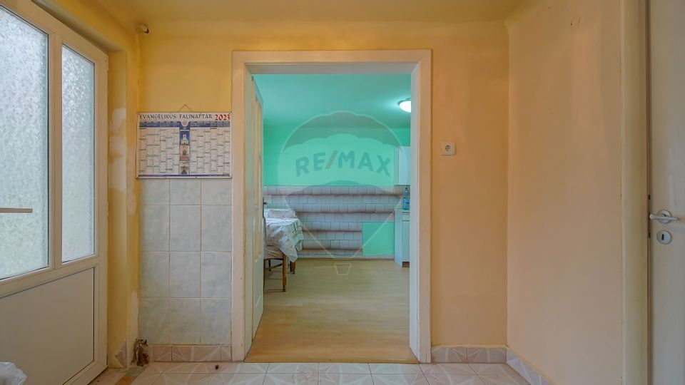 Casa individuala cu doua corpuri, teren 1000mp