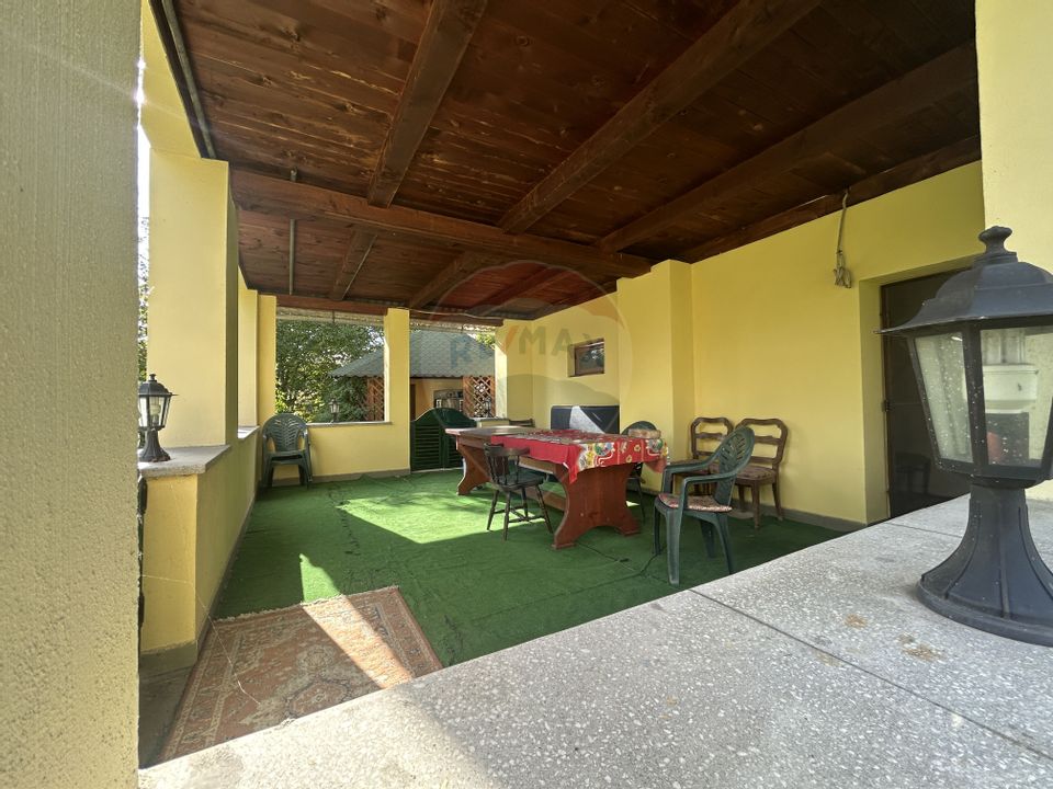 Casa - sura cu 16 ari teren de vânzare în Buşag