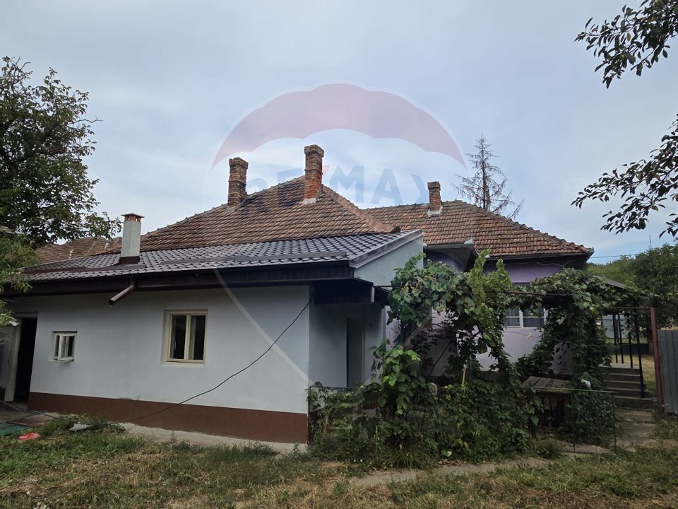 Casă si teren de 1195mp in Tinca