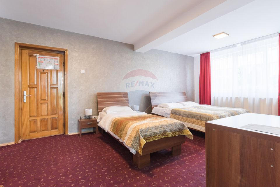 Hotel cu 23 unități de cazare, 2 săli de ședință, locație excelentă