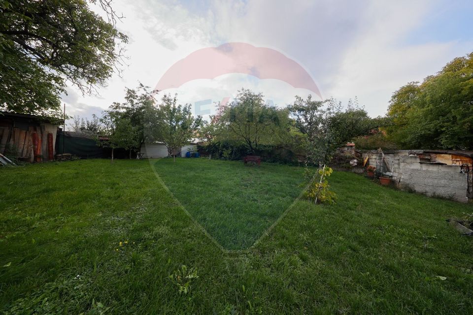 Casă 6 camere și teren 1200 mp