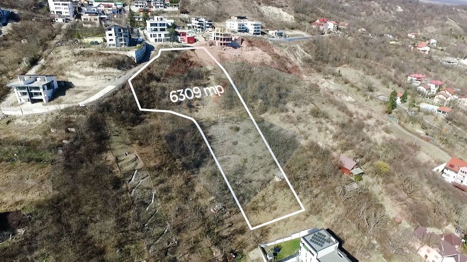 Teren 6309mp cu panoramă superbă asupra orașului – Uliului, Grigorescu
