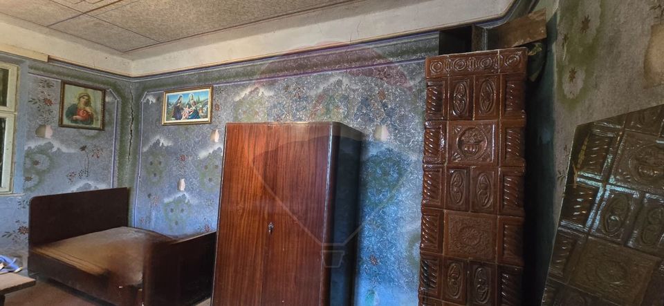 Teren si casă cu teren generos în Socodor