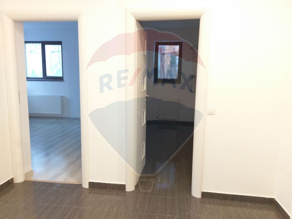 2 room apartment + central heating + parking space for sale Gorj area