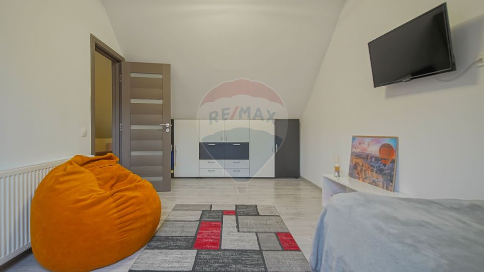 Casa individuala cu doua corpuri, teren 1000mp