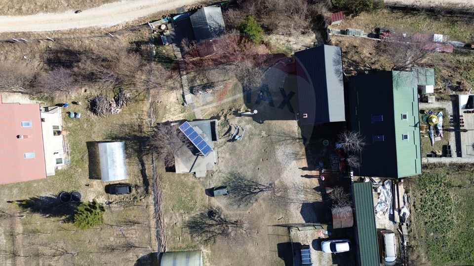 Ansamblu rezidențial cu casă principală și anexe, teren 1.487 mp