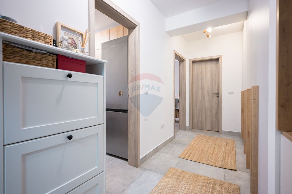 Apartament cu 2 camere,  2 băi și parcare subterană în Tractorul